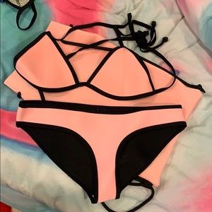 Traingl pink and black bathing suit